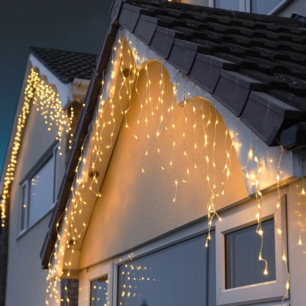 Set 2 x Instalatie pentru Craciun - Franjuri, cu LED-uri Tip Turturi, 12 metri - Alb Cald